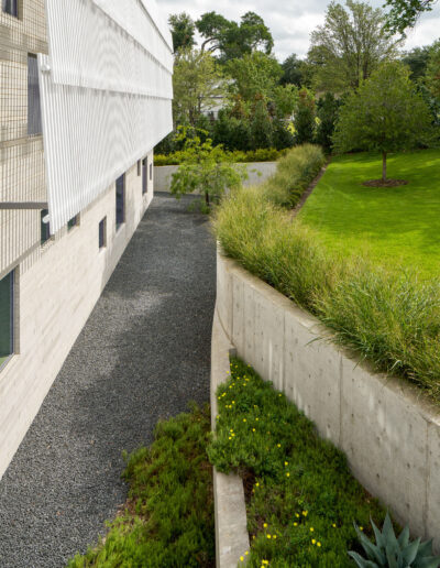 Side of gorgeous modern home walkway.