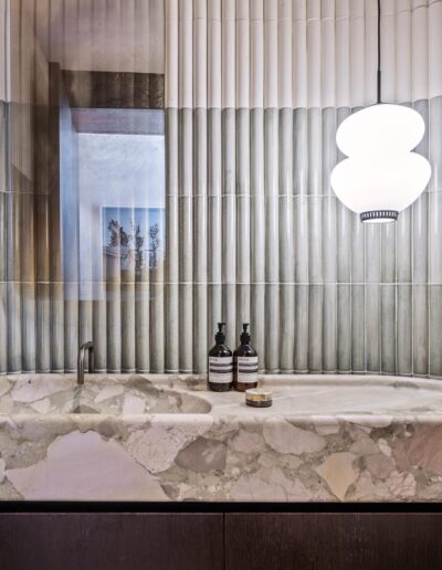 Marble countertop bathroom sink.